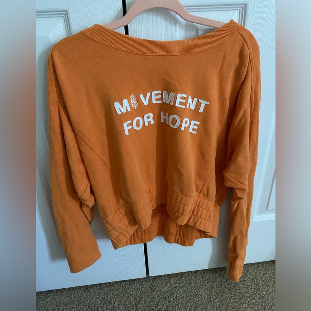 Orange Free people movement cropped hoodie